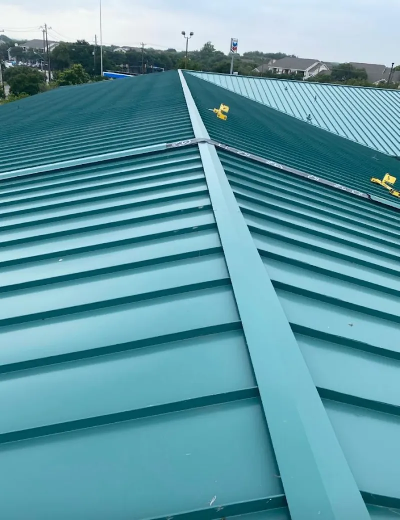 Green commercial metal roof ridge and valley for Metal Roof Repair in Winchester